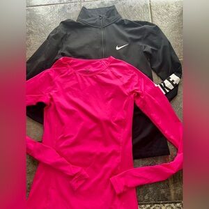 2 women’s size M running tops. Perfect condition.